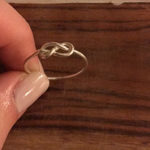 a ring with a knot detail